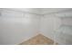 Walk-in closet with tiled floor and wire shelving at 279 Mark Twain Ln, Rotonda West, FL 33947