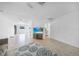 Bright living room featuring tile flooring and neutral wall paint at 279 Mark Twain Ln, Rotonda West, FL 33947