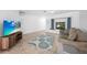 Bright living room featuring tile flooring and a cozy window seat at 279 Mark Twain Ln, Rotonda West, FL 33947