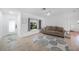Inviting living room featuring tile flooring and a cozy window seat at 279 Mark Twain Ln, Rotonda West, FL 33947