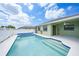 Sparkling pool with a white fence offers a refreshing oasis at 279 Mark Twain Ln, Rotonda West, FL 33947