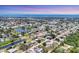 Beautiful aerial view of home's desirable location and surrounding community amenities at 305 E Wentworth Cir, Englewood, FL 34223