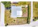 Enjoy the privacy of this homes secluded backyard, surrounded by lush greenery at 305 E Wentworth Cir, Englewood, FL 34223