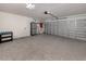 Spacious garage with epoxy flooring, providing ample room for parking and storage at 3695 Waffle Ter, North Port, FL 34286