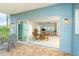 View from the balcony, sliding door reveals an inside dining area and Gathering room at 3929 Cape Haze Dr # 101, Rotonda West, FL 33947