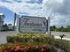 Elegant Townhomes at Cape Haze community sign with lush landscaping at 3929 Cape Haze Dr # 101, Rotonda West, FL 33947