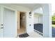View inside the front door to unit 101 with view of the private garage access at 3929 Cape Haze Dr # 101, Rotonda West, FL 33947