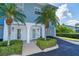 Up close exterior view featuring lush landscaping and private entrances to unit 101 and 102 at 3929 Cape Haze Dr # 101, Rotonda West, FL 33947