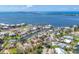 An aerial view of a canal front homesite with lush greenery and beautiful waterfront views at 500 Green Dolphin S Dr, Placida, FL 33946