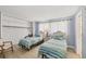 Comfortable bedroom with twin beds, light blue walls, and a large closet at 500 Green Dolphin S Dr, Placida, FL 33946