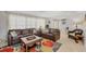 Inviting living room with modern sofas, a vibrant rug, and plenty of natural light at 500 Green Dolphin S Dr, Placida, FL 33946