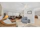 Open-concept living room boasting comfortable seating, natural light and neutral tones at 500 Green Dolphin S Dr, Placida, FL 33946