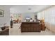 Spacious living room with abundant natural light, neutral walls, and stylish furnishings at 500 Green Dolphin S Dr, Placida, FL 33946