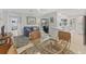 Open-concept living space connects dining and living areas with access to the pool area at 500 Green Dolphin S Dr, Placida, FL 33946