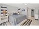 Comfortable main bedroom with nautical accents and soft lighting, with closet access at 500 Green Dolphin S Dr, Placida, FL 33946