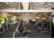 A spacious gym features modern equipment, mirrors and neutral paint at 5000 Gasparilla Rd # 8B, Boca Grande, FL 33921