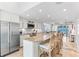 Beautiful kitchen features stainless steel appliances, stone countertops, and ocean views at 5000 Gasparilla Rd # 8B, Boca Grande, FL 33921
