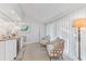 Inviting sitting room with luxury furnishing, decor, and lots of natural light at 5000 Gasparilla Rd # 8B, Boca Grande, FL 33921