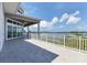 Expansive balcony, ideal for entertaining while overlooking the tranquil waterfront at 565 Green Dolphin S Dr, Placida, FL 33946