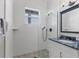 A bright bathroom with a large shower and granite vanity at 565 Green Dolphin S Dr, Placida, FL 33946
