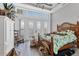 A bright bedroom with French doors and waterfront views at 565 Green Dolphin S Dr, Placida, FL 33946