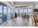 Bright dining area with large windows and views of the water at 565 Green Dolphin S Dr, Placida, FL 33946