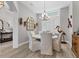 Elegant dining area featuring a modern chandelier and refined decor at 565 Green Dolphin S Dr, Placida, FL 33946