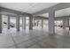 Expansive open garage under the home, perfect for storage or workspace with views of the water at 565 Green Dolphin S Dr, Placida, FL 33946
