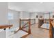 A bright hallway shows oak trim and wood floors at 565 Green Dolphin S Dr, Placida, FL 33946