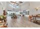 Open living room with high ceilings, clerestory windows, built-in shelving, and neutral decor at 565 Green Dolphin S Dr, Placida, FL 33946