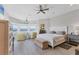 A well-lit main bedroom offers peaceful waterfront views at 565 Green Dolphin S Dr, Placida, FL 33946