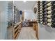Well-organized wine cellar featuring custom shelving and climate control at 565 Green Dolphin S Dr, Placida, FL 33946