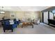 Bright living room with comfortable seating, neutral colors, and natural light at 5700 Gulf Shores Dr # B-137, Boca Grande, FL 33921