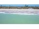Beautiful beachfront property with sandy beach and clear turquoise ocean views at 6430 Manasota Key Rd, Englewood, FL 34223