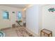 Welcoming entryway with natural light, beach access, and built-in storage for a convenient transition at 6430 Manasota Key Rd, Englewood, FL 34223