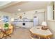 Cozy kitchen and dining area with natural light and essential appliances for convenient meals at 6430 Manasota Key Rd, Englewood, FL 34223