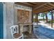 Outdoor kitchen area with beach access, ideal for grilling and relaxing while enjoying the coastal scenery at 6430 Manasota Key Rd, Englewood, FL 34223