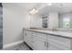 Stylish bathroom featuring double vanities, granite countertops, and modern finishes at 8270 Cook Ct, Port Charlotte, FL 33981