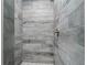 Modern shower with stylish tile and fixtures, creating a spa-like experience at 8270 Cook Ct, Port Charlotte, FL 33981