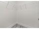 This walk-in closet has bright white walls and a wire shelving system at 8270 Cook Ct, Port Charlotte, FL 33981
