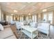 Large community lounge featuring comfortable seating, elegant decor, and plenty of natural light at 8952 Scallop Way, Placida, FL 33946