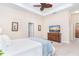 Bedroom featuring a plush bed, neutral tones, and well-placed decor at 8952 Scallop Way, Placida, FL 33946