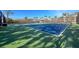 Community tennis courts with lush landscaping and great light at 8952 Scallop Way, Placida, FL 33946