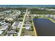 Find the property in a waterfront neighborhood with scenic pond views, mature trees, and convenient coastal proximity at 9064 Bantry Bay Blvd, Englewood, FL 34224