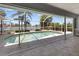 Screened in pool area with view of a beautiful lake at 9064 Bantry Bay Blvd, Englewood, FL 34224