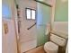 Accessible bathroom features a walk-in shower with grab bars for safety and convenience at 9270 Little Gasparilla Is, Placida, FL 33946