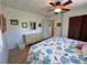 Inviting bedroom showcases wood floors, beach-themed bedding, and ample natural light at 9270 Little Gasparilla Is, Placida, FL 33946