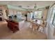 Open kitchen with island seating, dining area, and ample counter space, perfect for cooking and entertaining at 9270 Little Gasparilla Is, Placida, FL 33946