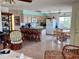 Open-concept kitchen featuring a breakfast bar, dining area, and ample cabinet space, creating a welcoming atmosphere at 9270 Little Gasparilla Is, Placida, FL 33946