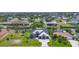 Beautiful home with a well-manicured lawn, boat dock, and waterfront access at 9532 Miami Cir, Port Charlotte, FL 33981